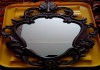 Фото Зеркало настенное овальное в литой раме под старую бронзу